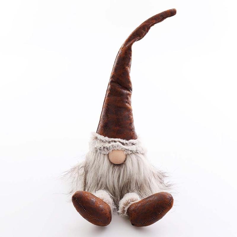 Tomte sittandes brun skinnluva